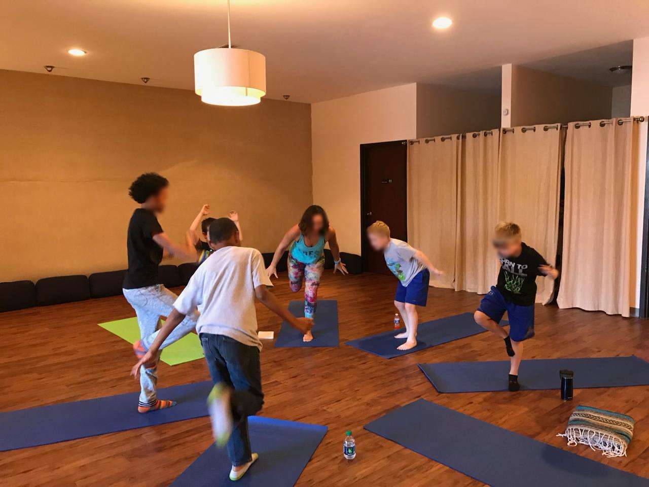 Kara leading kids in movement — energy and laughter every afternoon