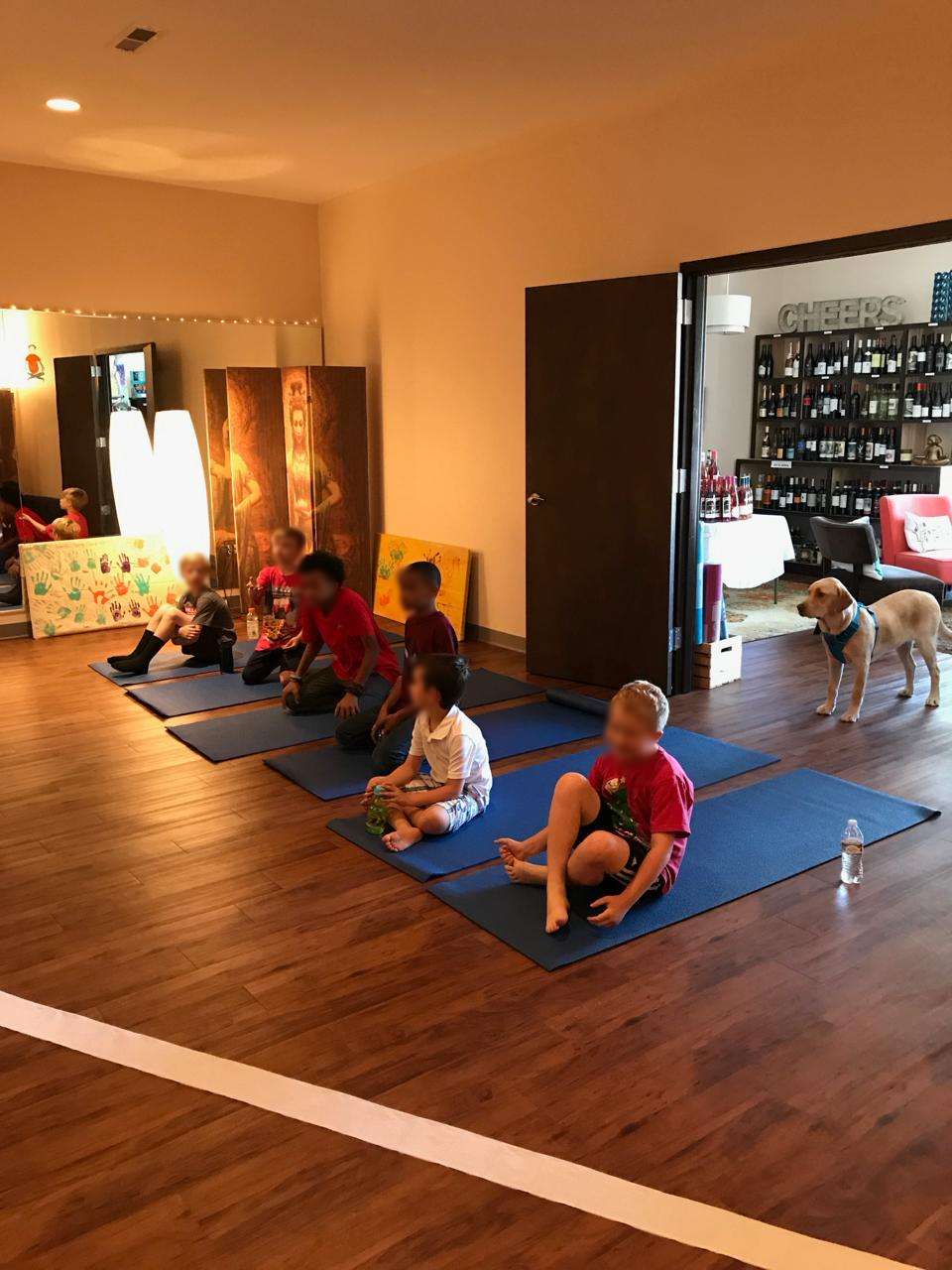 Campers with a dog at camp — the relaxed, curious, warm side of Zin Kids